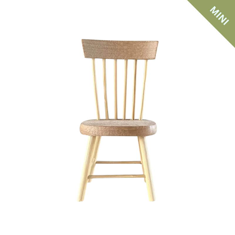 Wooden chair with wicker backrest on a white background