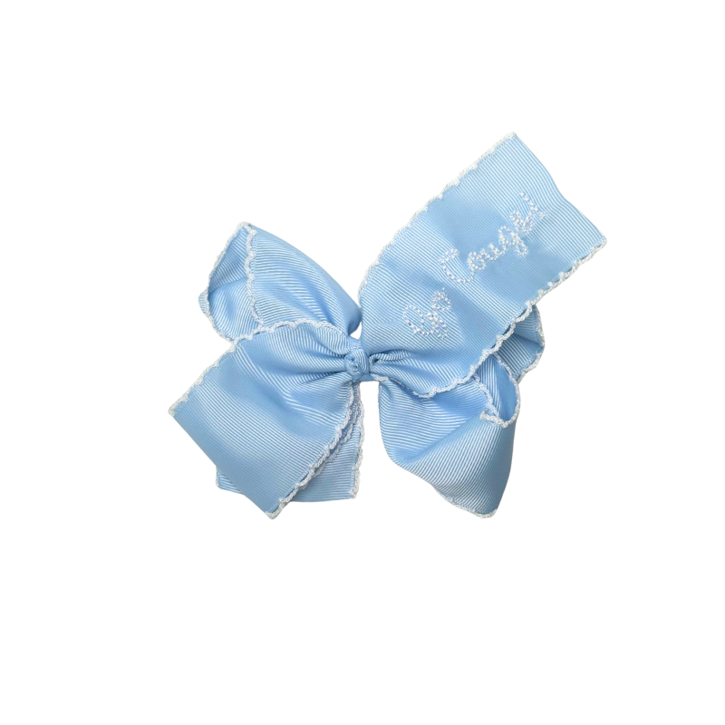 Light blue bow with white lace details on a white background