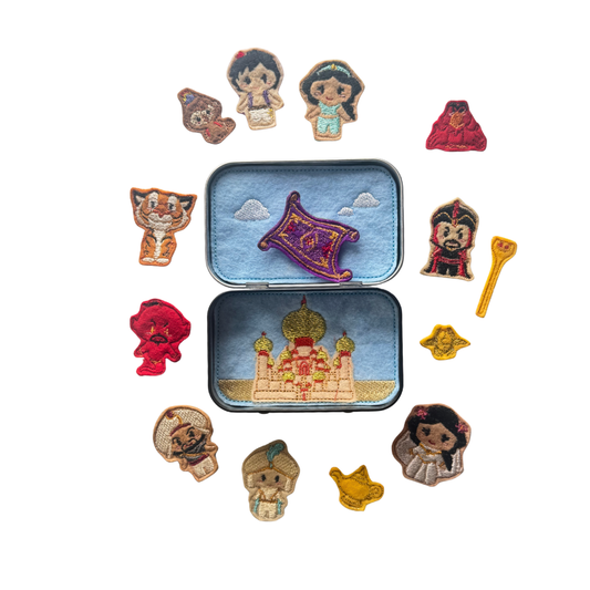 Collection of embroidered characters around a tin with a castle design on a white background