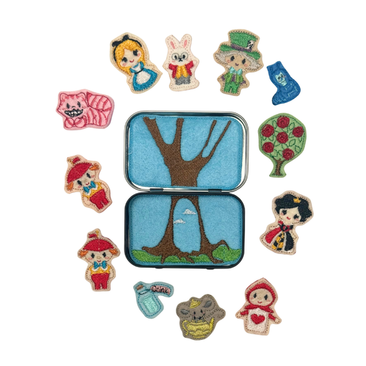 Collection of colorful character patches around a small tin with a tree design on a white background