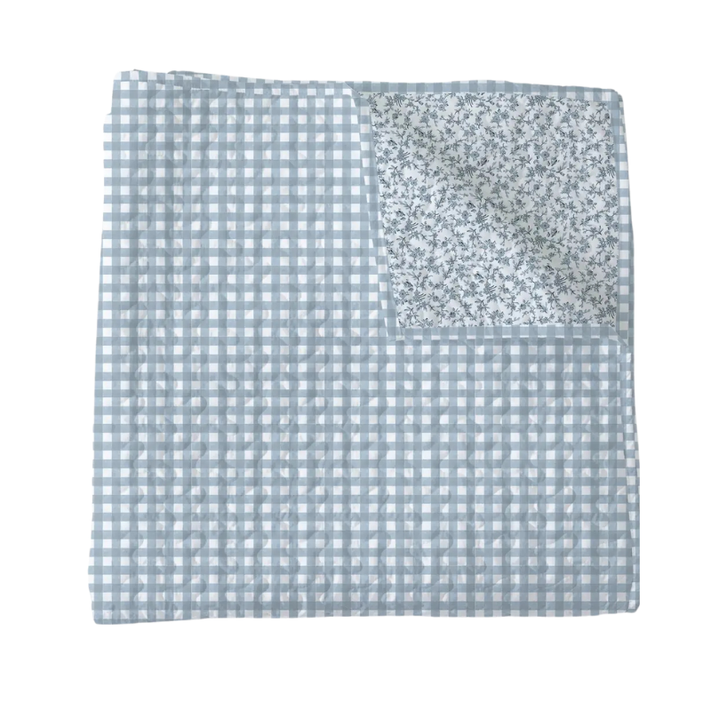Baby blanket with blue checkered pattern on a white background