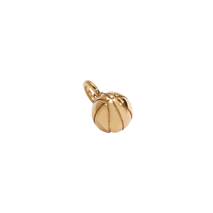 Gold basketball charm on a white background