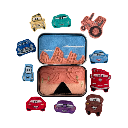 Collection of colorful car-shaped patches on a white background