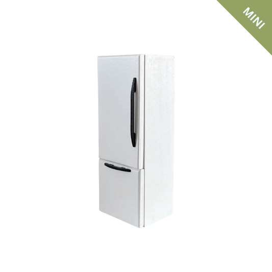 White refrigerator with black handles on a white background