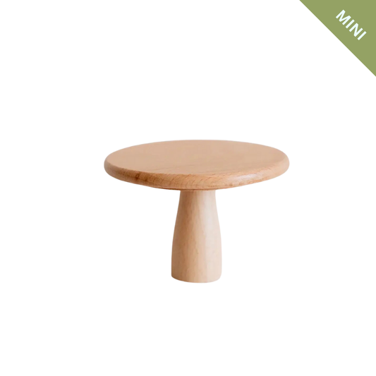 Small wooden table with a minimalist design on a white background