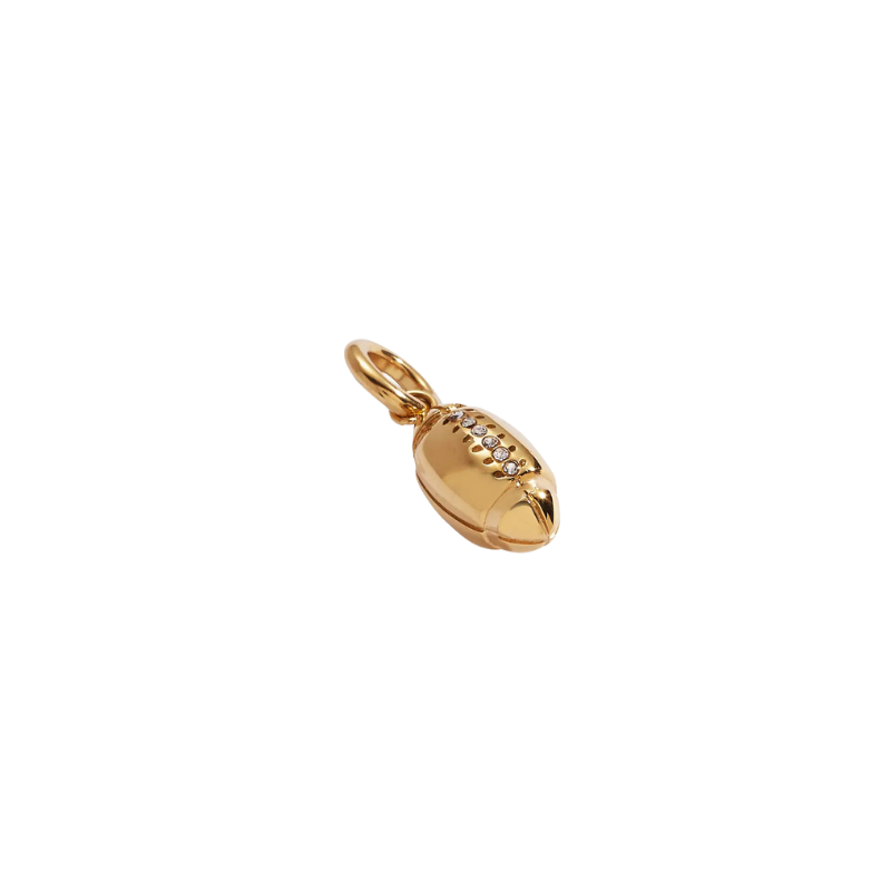 Gold football-shaped pendant with embedded stones on a white background