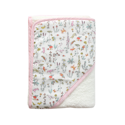 Baby towel with Liberty of London animal and floral pattern on a white background