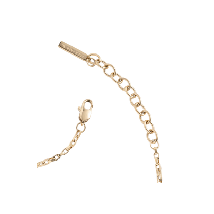 Gold chain bracelet with clasp on a white background