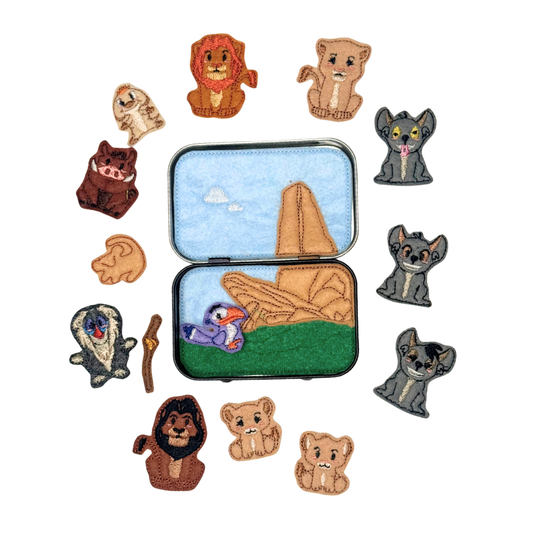 Set of embroidered animal patches with a travel-themed case on a white background