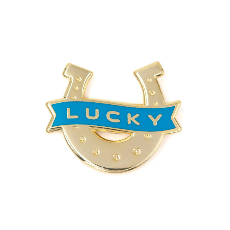 Gold horseshoe with a blue banner displaying 'LUCKY' on a white background