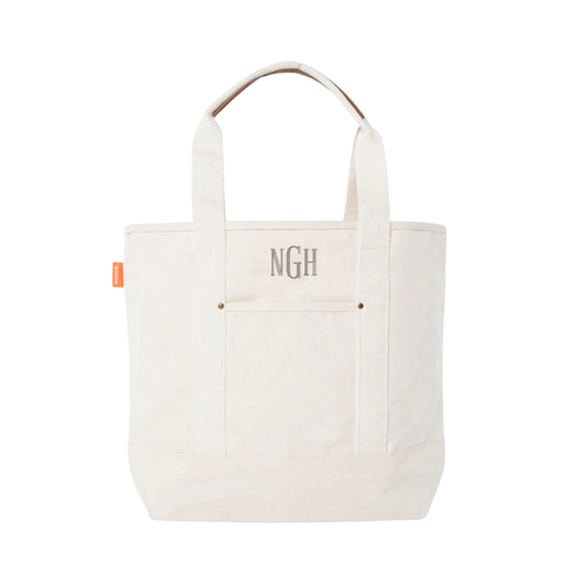 White tote bag with 'NGH' branding on a white background