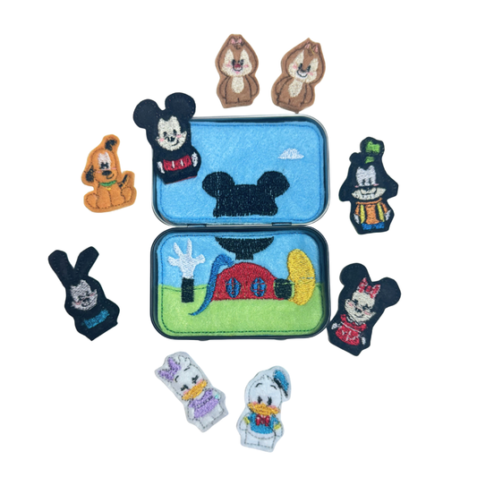 Set of embroidered patches featuring cartoon characters on a white background