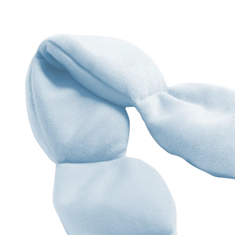 Light blue weighted sleep mask on a white background