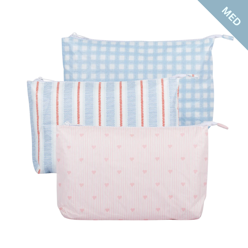 Three fabric bags with different patterns on a white background
