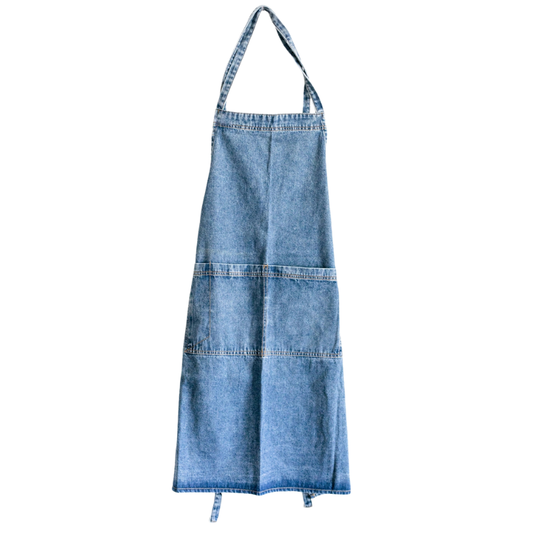 Blue denim apron on a white background